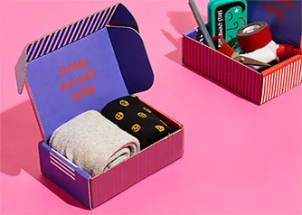 Custom striped mailer box with socks inside and branded interior for apparel